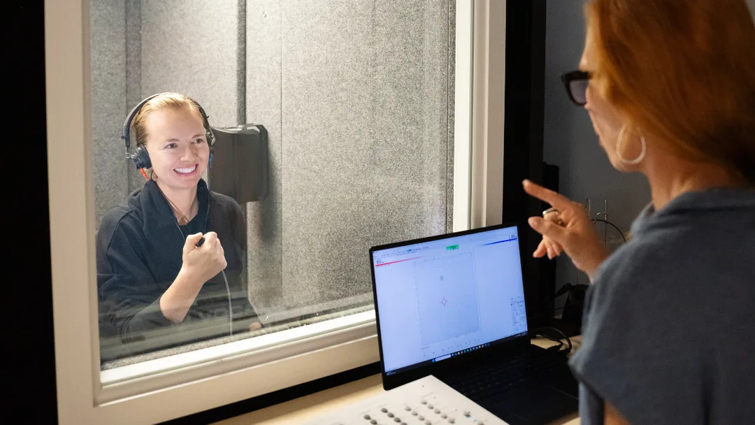 Patient receiving a hearing evaluation at Ekho Audiology in Bend, OR